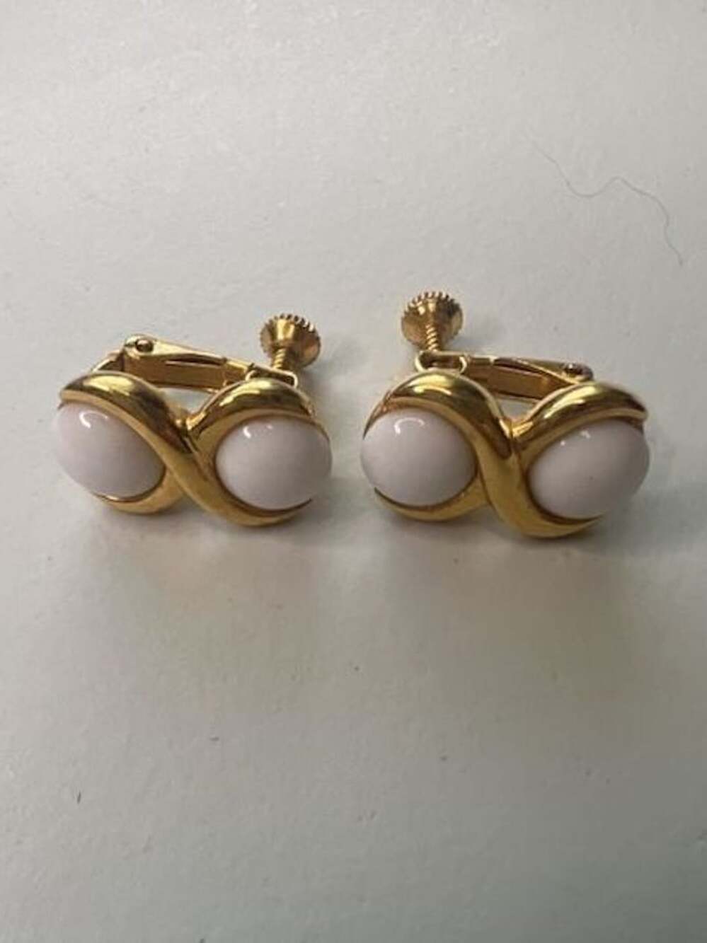 Napier Goldtone White Cabochon Infinity Clip Earrings